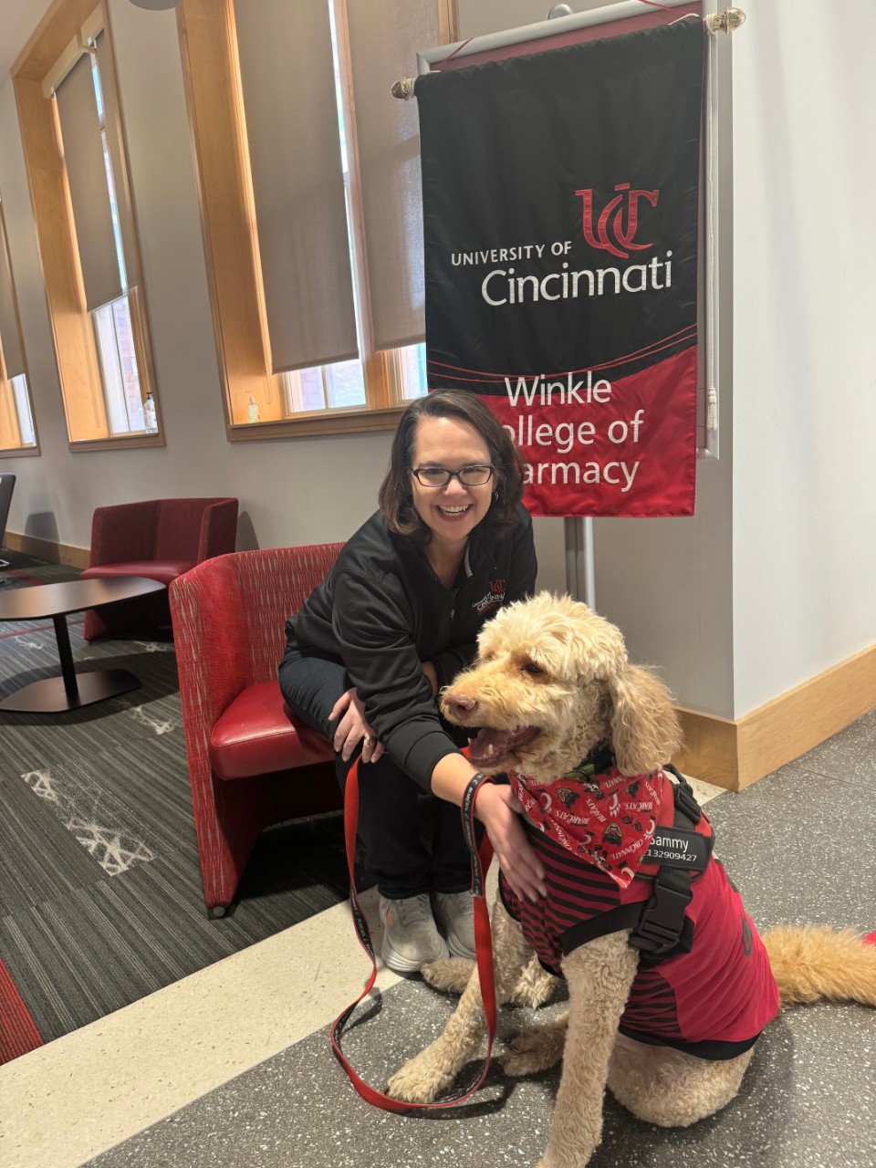 Embedded CAPS counselor Christy Wolfram with Sammy the Therapy Dog